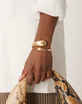 ASOS DESIGN cuff bracelet with wrap around molten detail with shiny and brushed gold tone 3