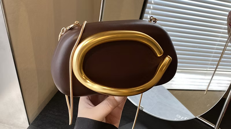 Oval Clutch bag